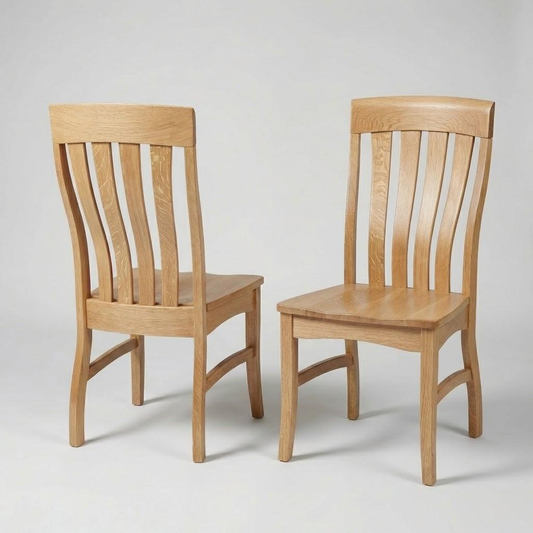 Two wooden solid hardwood usa handcrafted custom quarter-sawn white oak dining chairs on a light gray background