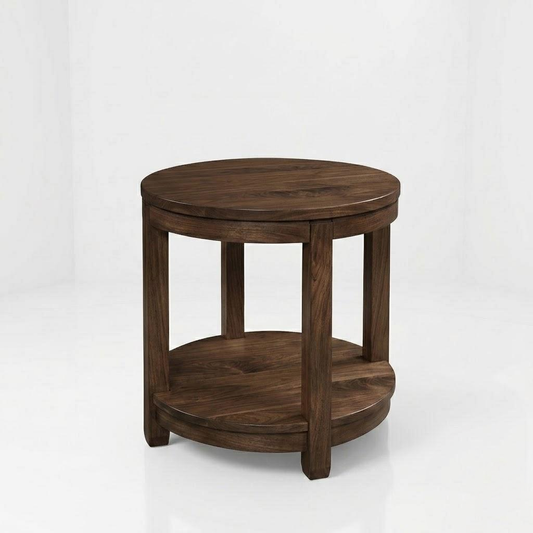 The Adams Round End Table features a round silhouette with four sturdy legs and a convenient lower shelf. Handcrafted by American artisans from solid wood and finished in a rich dark brown, this table boasts a durable top coat for lasting beauty. Shown here in a simple white setting, it offers timeless style and quality craftsmanship.