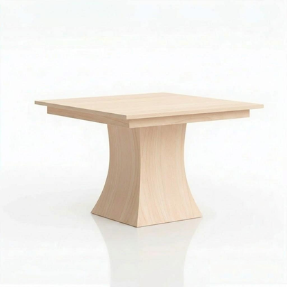 The Ambrose Dining Table, a square, light wood table with a gracefully curved rectangular pedestal base—handcrafted in solid wood by American craftsmen—is set against a plain white background.