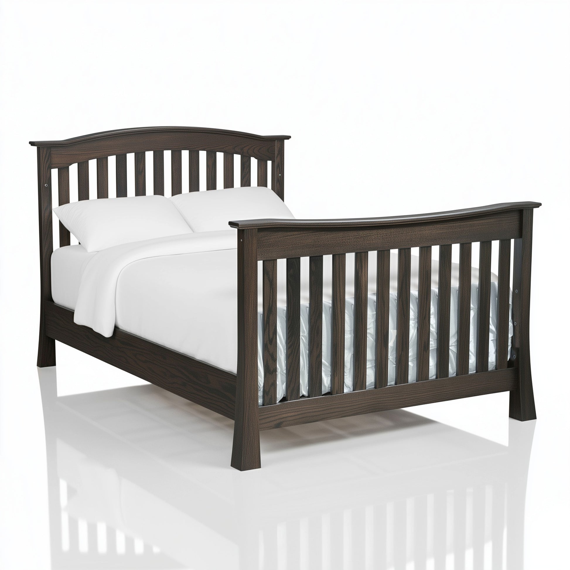 The Archer crib converted into a twin bed, on white. 