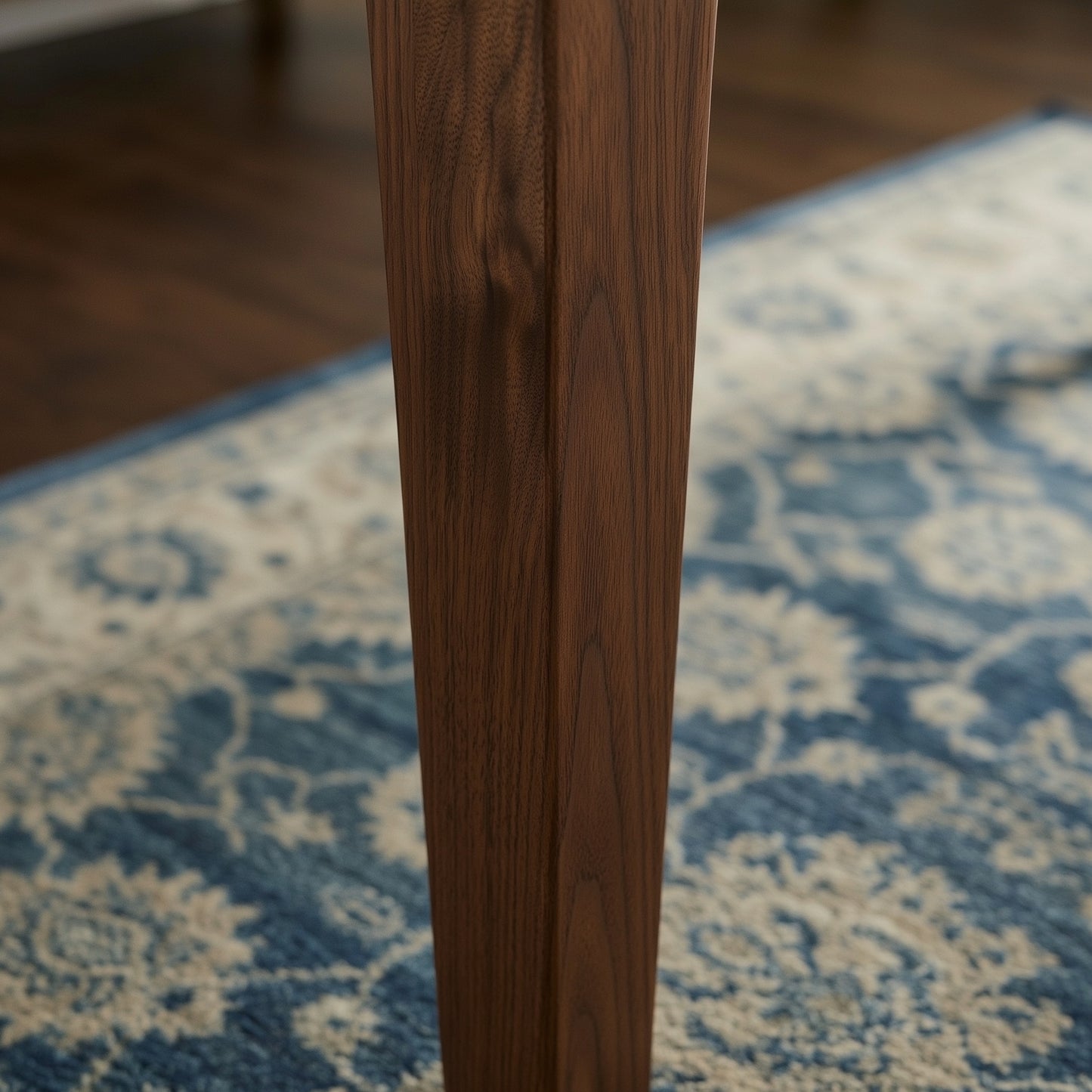 Close up image of the walnut legs on the brooks table
