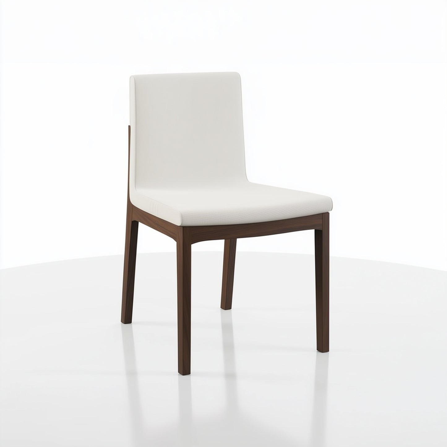 The Carver Chair features a white cushioned seat and backrest with sleek dark wooden legs, displayed on a white surface against a plain white background.