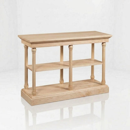 Introducing The Drake Console Table: meticulously handcrafted from solid wood by skilled American artisans, this light wood console features two spacious shelves and four vertical columns, all supported by a sturdy base. Finished with a durable top coat for lasting strength, The Drake Console Table elegantly enhances any space while standing out against a plain white background.