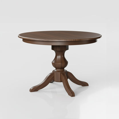 The Drayton Dining Table, handcrafted in the USA, features a smooth solid walnut round top and a central base with four curved legs, shown against a plain white background.