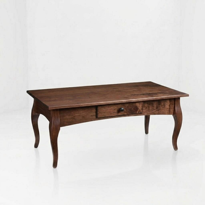 The Fox Rectangle Coffee Table, expertly handcrafted from solid wood by skilled American craftsmen, showcases elegant curved legs and a central drawer. Finished with a durable top coat, this dark wooden piece is photographed against a plain white background.