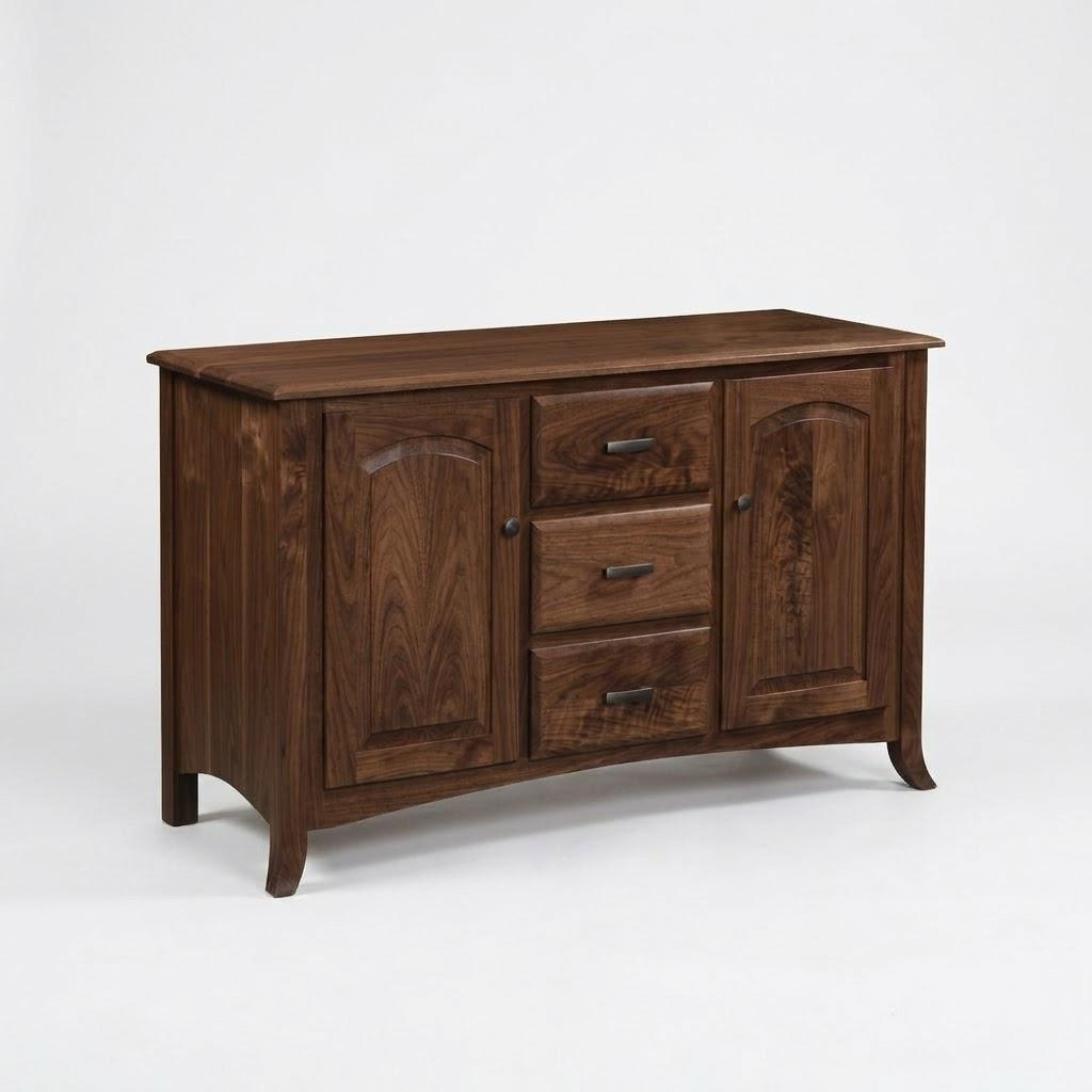 The Gibson Sideboard is a handcrafted dark wood piece with three central drawers flanked by two cabinet doors featuring adjustable wood shelves.