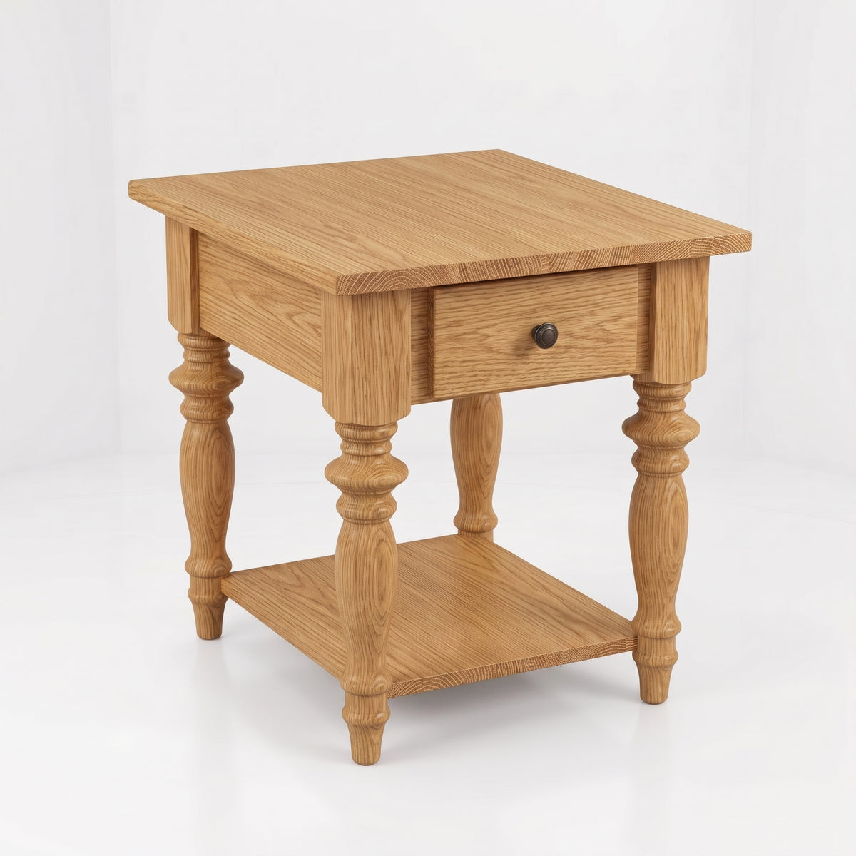 The Lincoln End Table features a rectangular top, ornate turned legs, a single drawer with a round knob, and a lower shelf. Expertly handcrafted by American craftsmen from solid wood, this side table showcases a natural wood finish.