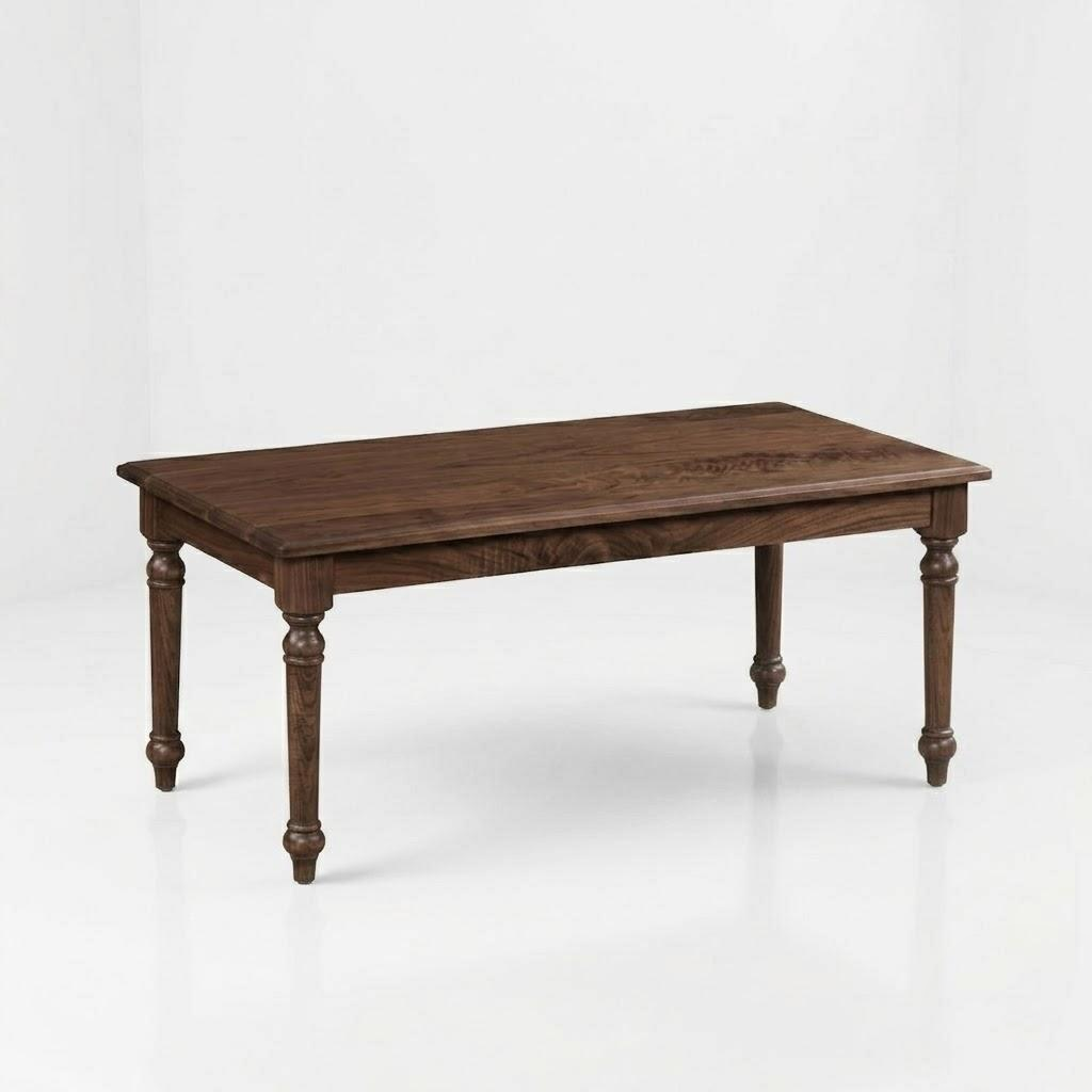 The Marcy Rectangle Coffee Table, handcrafted from solid wood by American craftsmen, features a dark finish and four turned legs, and is displayed against a plain white background.