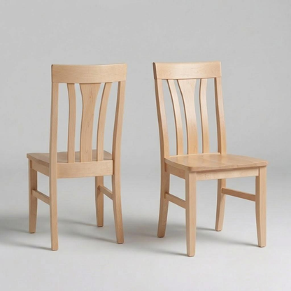 Two Marigold Chairs, handcrafted in the USA from solid hardwood with light wood finishes, feature slatted backs and square seats. They are placed side by side on a plain, light gray background—one chair facing forward and the other angled slightly to the side.