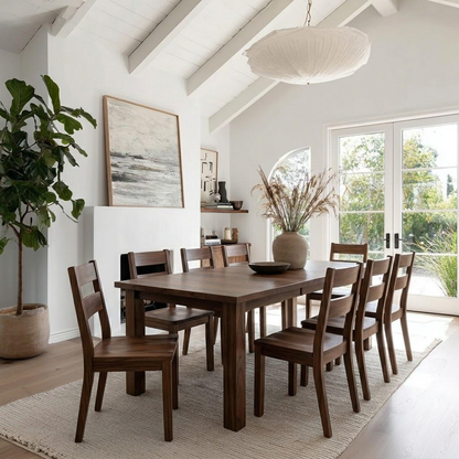 solid walnut extendable dining table usa made handcrafted solid hardwood with matching walnut chairs. white dining room with fireplace, jute rug and fiddle leaf tree.