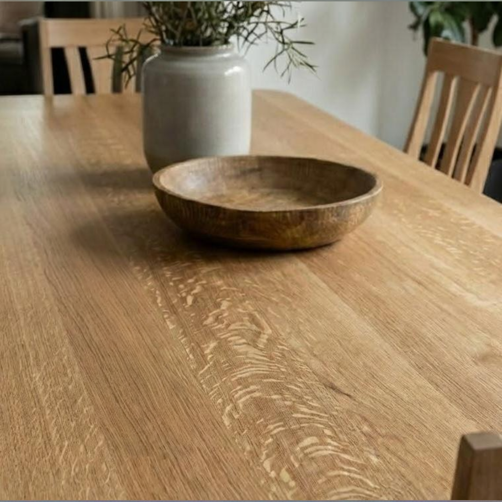 Wooden bowl on a wooden table with a blurred background