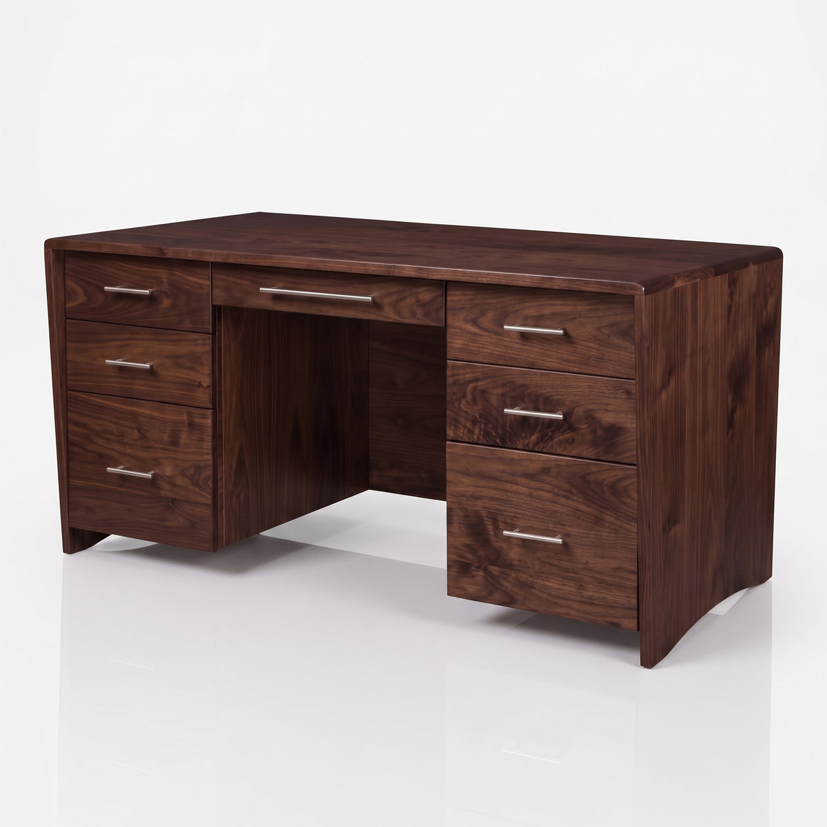 A dark brown wooden writing desk with a rich grain, featuring a center drawer, three drawers on the left, and three drawers on the right, each with a slim silver metal pull handle, set against a clean white background.