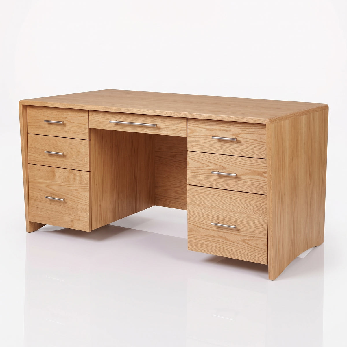 A light oak wood writing desk with a central open space, featuring three drawers on the left, a single drawer on top, and three drawers on the right, all with silver metal handles.