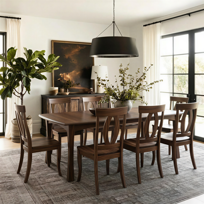 Dining room with wooden solid hardwood walnut handcrafted usa made table and chairs large window, and decorative elements.