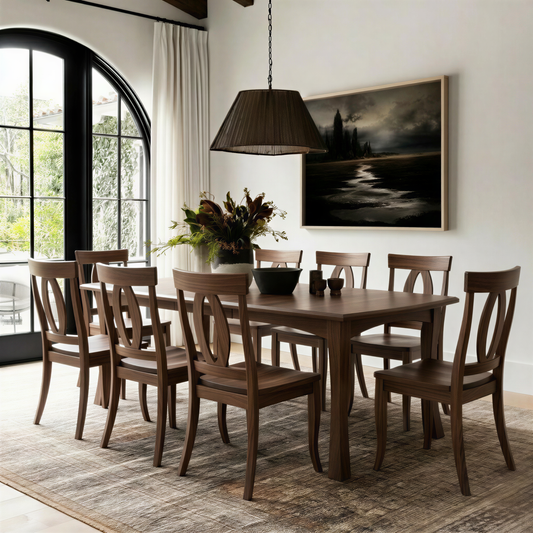 Dining room with wooden solid hardwood walnut handcrafted usa made table and chairs, large windows, and a painting on the wall.