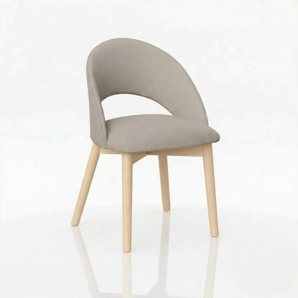 Introducing The Oakes Chair: a modern design handcrafted in the USA from solid hardwood, featuring light wooden legs and a gracefully curved, light gray upholstered seat and backrest—beautifully showcased against a plain white background.