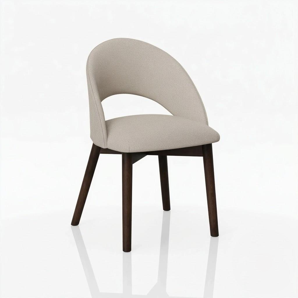 The Oakes Chair features a curved, light beige upholstered backrest and seat, complemented by dark solid hardwood legs, all set against a plain white background.