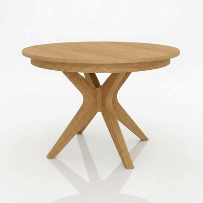The Stafford Dining Table is a round, handcrafted solid wood piece featuring a smooth tabletop and a distinctive Y-shaped base, presented against a plain white background.