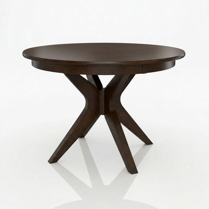The Stafford Dining Table is a round, dark solid wood table handcrafted with a smooth surface and four angled legs that merge at the center, set against a plain white background. Expertly made by American craftsmen, this elegant piece exemplifies timeless quality and meticulous attention to detail.